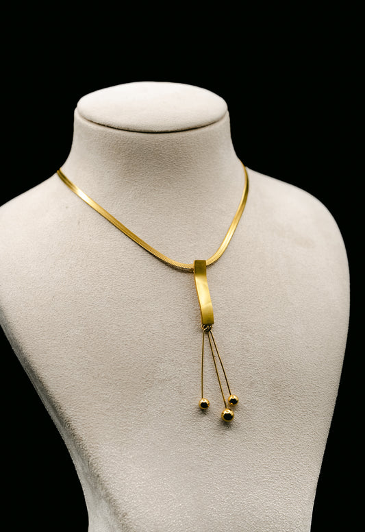Stringed metal ball with Snake chain